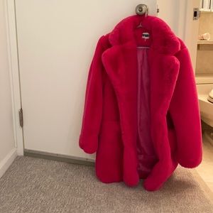 Hot Pink knee length ultra soft and cozy faux fur jacket.